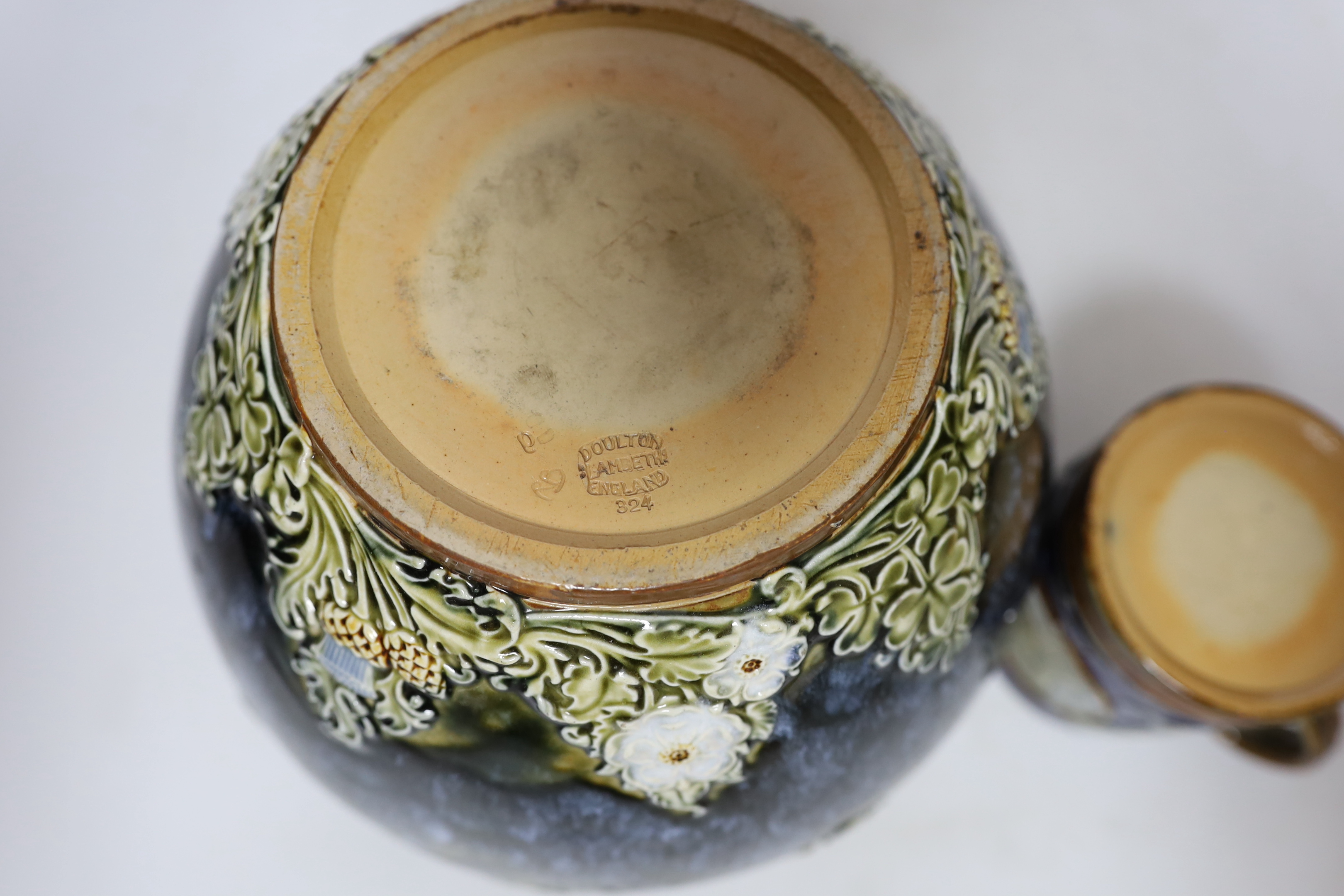 A Royal Doulton Lambeth Edward VII coronation mug and a Royal Doulton jardiniere, 18cm (2)